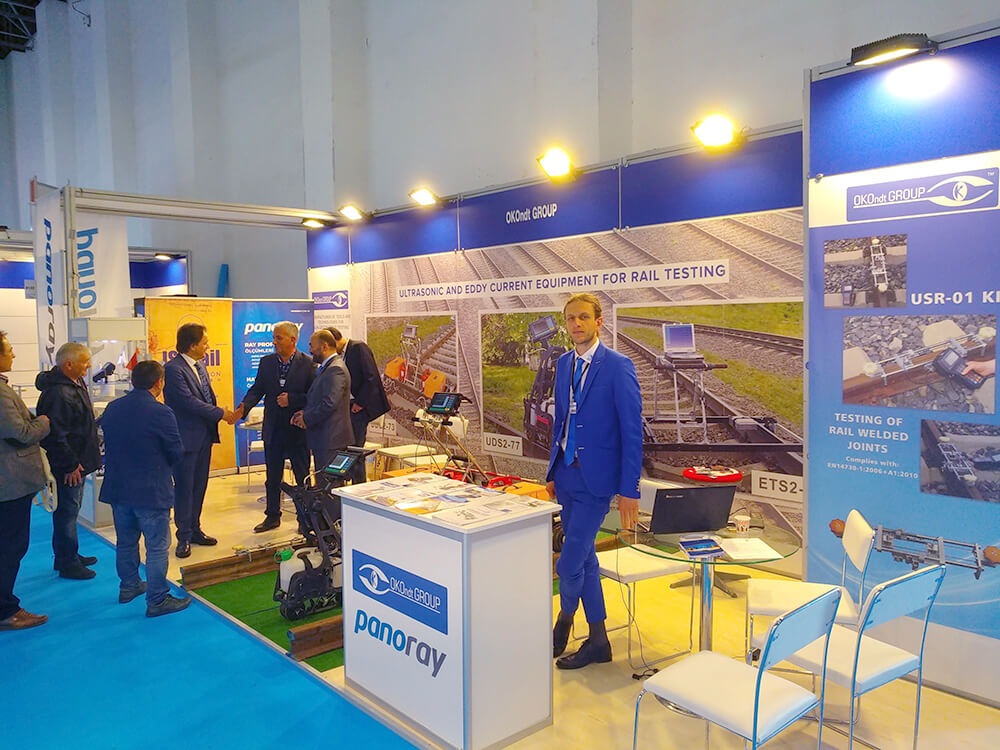 Специалист OKOndt Group встречает посетителей  Eurasia Rail на стенде компании